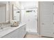 Sleek bathroom boasts modern fixtures, a spacious shower, and ample natural light at 9829 E Talon Ave, Mesa, AZ 85212