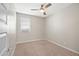 Bedroom with carpet and window with blinds at 9829 E Talon Ave, Mesa, AZ 85212