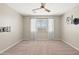 Relaxing bedroom with soft carpet and neutral walls creates a peaceful retreat at 9829 E Talon Ave, Mesa, AZ 85212