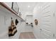 Organized walk-in closet with hanging storage and shelves, maximizing space and functionality at 9829 E Talon Ave, Mesa, AZ 85212
