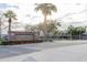 Inviting entrance sign to Starpointe community surrounded by lush landscaping and palm trees at 10130 S 185Th Dr, Goodyear, AZ 85338