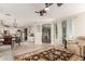 Open-concept living space with seamless transitions to the kitchen and outdoor areas, creating a bright and inviting atmosphere at 10130 S 185Th Dr, Goodyear, AZ 85338