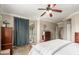 Inviting main bedroom offers a relaxing ambiance with neutral tones, soft textures, and access to an outdoor balcony at 10130 S 185Th Dr, Goodyear, AZ 85338