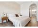 Neutral bedroom featuring light-toned walls, wood-look flooring, and a serene ambiance at 14575 W Mountain View Blvd # 11308, Surprise, AZ 85374