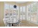 Breakfast nook with charming shuttered windows providing lots of natural light at 14950 W Mountain View Blvd # 7111, Surprise, AZ 85374