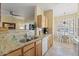Well-appointed kitchen with granite countertops and ample cabinet space at 14950 W Mountain View Blvd # 7111, Surprise, AZ 85374