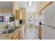 Galley kitchen with granite countertops and stainless steel appliances at 14950 W Mountain View Blvd # 7111, Surprise, AZ 85374