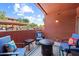 Relaxing patio with comfortable seating and a fire pit with views of the community at 14950 W Mountain View Blvd # 7111, Surprise, AZ 85374