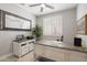 Serene home office with natural light, a stylish desk, a bull wall art, and neutral decor at 15133 W Wildfire Dr, Surprise, AZ 85374