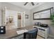 Bright home office with neutral decor, a desk, a printer, and a bull wall art at 15133 W Wildfire Dr, Surprise, AZ 85374