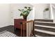 Inviting foyer features a staircase, accent furniture, and decor elements at 15423 N 22Nd Dr, Phoenix, AZ 85023