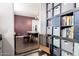 Hallway transitions into dining area, highlighted by built-in shelving for organized storage at 15423 N 22Nd Dr, Phoenix, AZ 85023