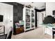 This home office features storage, a ceiling fan and neutral colors with minimal clutter at 15423 N 22Nd Dr, Phoenix, AZ 85023