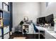 Bright office space features a practical layout with storage and a sleek desk setup at 15423 N 22Nd Dr, Phoenix, AZ 85023
