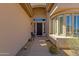 Inviting front entrance with desert landscaping, a decorative door, and stylish exterior design at 15608 E Chaparral Way, Fountain Hills, AZ 85268