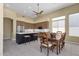 Open concept kitchen features stainless steel appliances and a dining table at 15608 E Chaparral Way, Fountain Hills, AZ 85268