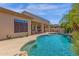Beautiful backyard with a sparkling pool and spa, surrounded by lush landscaping at 15608 E Chaparral Way, Fountain Hills, AZ 85268