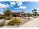 Beautiful, low-maintenance desert landscaping adorns this single-Gathering home with tile roof at 15691 W Arbor Trl, Surprise, AZ 85374