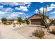 Single Gathering home featuring desert landscaping and a tile roof at 15691 W Arbor Trl, Surprise, AZ 85374