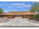 Charming townhouse with desert landscaping, a private two-car garage, and concrete driveway at 15834 E Sunflower Dr # 2, Fountain Hills, AZ 85268