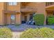 Charming front porch with seating, lush landscaping, and a well-maintained exterior at 15834 E Sunflower Dr # 2, Fountain Hills, AZ 85268