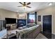 Comfortable living room with fireplace, ceiling fan, and stylish decor, open to the entry way at 15834 E Sunflower Dr # 2, Fountain Hills, AZ 85268