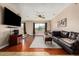 Spacious living room with hard floors, modern decor, and a large window at 16814 N 31St Ave, Phoenix, AZ 85053
