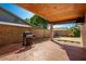 Covered patio with brick flooring, barbecue, outdoor speakers, and walled for privacy at 16814 N 31St Ave, Phoenix, AZ 85053