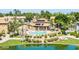 Aerial view of community pool and surrounding seating with lake in background at 1825 W Ray Rd # 2111, Chandler, AZ 85224