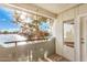 Balcony view of the lake with mature trees, creating a nature-filled outdoor space at 1825 W Ray Rd # 2111, Chandler, AZ 85224