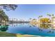 Reflective view of a community and palm trees in a pristine lake at 1825 W Ray Rd # 2111, Chandler, AZ 85224