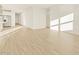Spacious living area with sleek tile floors and bright natural light at 20279 N 224Th Dr, Surprise, AZ 85387