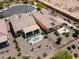 Aerial view of an outdoor patio with a seating area, artificial grass, and desert landscaping at 21090 N 267Th Dr, Buckeye, AZ 85396