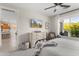 Bright bedroom with a large window, adjacent to the ensuite bathroom and walk-in closet at 21090 N 267Th Dr, Buckeye, AZ 85396