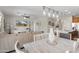 Open floor plan with view of the living room, dining area, and well-equipped kitchen at 21090 N 267Th Dr, Buckeye, AZ 85396