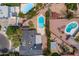 Aerial view of neighborhood featuring community pools and backyards at 211 W Braeburn Dr, Phoenix, AZ 85023