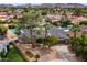 Aerial shot of a landscaped single-Gathering home featuring a private swimming pool and a well-manicured front yard at 211 W Braeburn Dr, Phoenix, AZ 85023