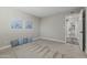 Bedroom featuring neutral paint, carpeting, and decor at 211 W Braeburn Dr, Phoenix, AZ 85023