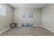 Bedroom featuring neutral paint, carpeting, and decor at 211 W Braeburn Dr, Phoenix, AZ 85023