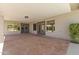 Beautiful covered patio with patterned concrete and easy access to the backyard at 211 W Braeburn Dr, Phoenix, AZ 85023