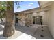 Charming front entry showcasing a stone wall and neutral paint, creating an inviting and appealing exterior at 211 W Braeburn Dr, Phoenix, AZ 85023