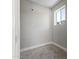 A bonus room featuring natural lighting from a window and grey paint at 211 W Braeburn Dr, Phoenix, AZ 85023