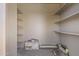 Unfinished storage area with open shelving at 211 W Braeburn Dr, Phoenix, AZ 85023