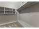 Spacious walk-in closet with shelving and storage for organization at 211 W Braeburn Dr, Phoenix, AZ 85023