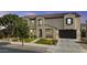 Charming two-story home featuring a tile roof, manicured lawn, and a two car garage at 21337 E Waverly Dr, Queen Creek, AZ 85142