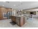 Modern kitchen featuring stainless steel appliances, granite countertops, and an open concept layout at 21337 E Waverly Dr, Queen Creek, AZ 85142