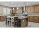 Beautiful kitchen with an oversized island, modern appliances, and ample counter space at 21337 E Waverly Dr, Queen Creek, AZ 85142
