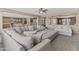Spacious living room featuring plush seating, neutral tones, and open floor plan, perfect for relaxing or entertaining at 21337 E Waverly Dr, Queen Creek, AZ 85142