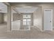 The spacious loft features an open floor plan and carpet, perfect for entertaining at 21337 E Waverly Dr, Queen Creek, AZ 85142