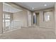 Bright loft offering versatile space, carpet, and easy access to other rooms at 21337 E Waverly Dr, Queen Creek, AZ 85142